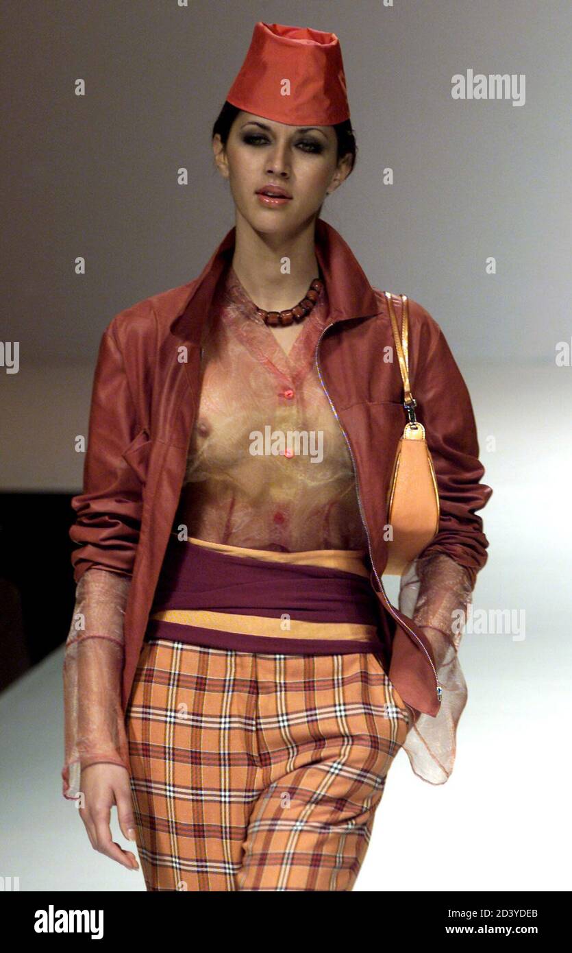 A model displays a creation as part of Alviero Martini's Spring/Summer  ready-to-wear women's collection 2001 at in Milan September 30, 2000. The  Milan fashion shows will run until October 6 Stock Photo -