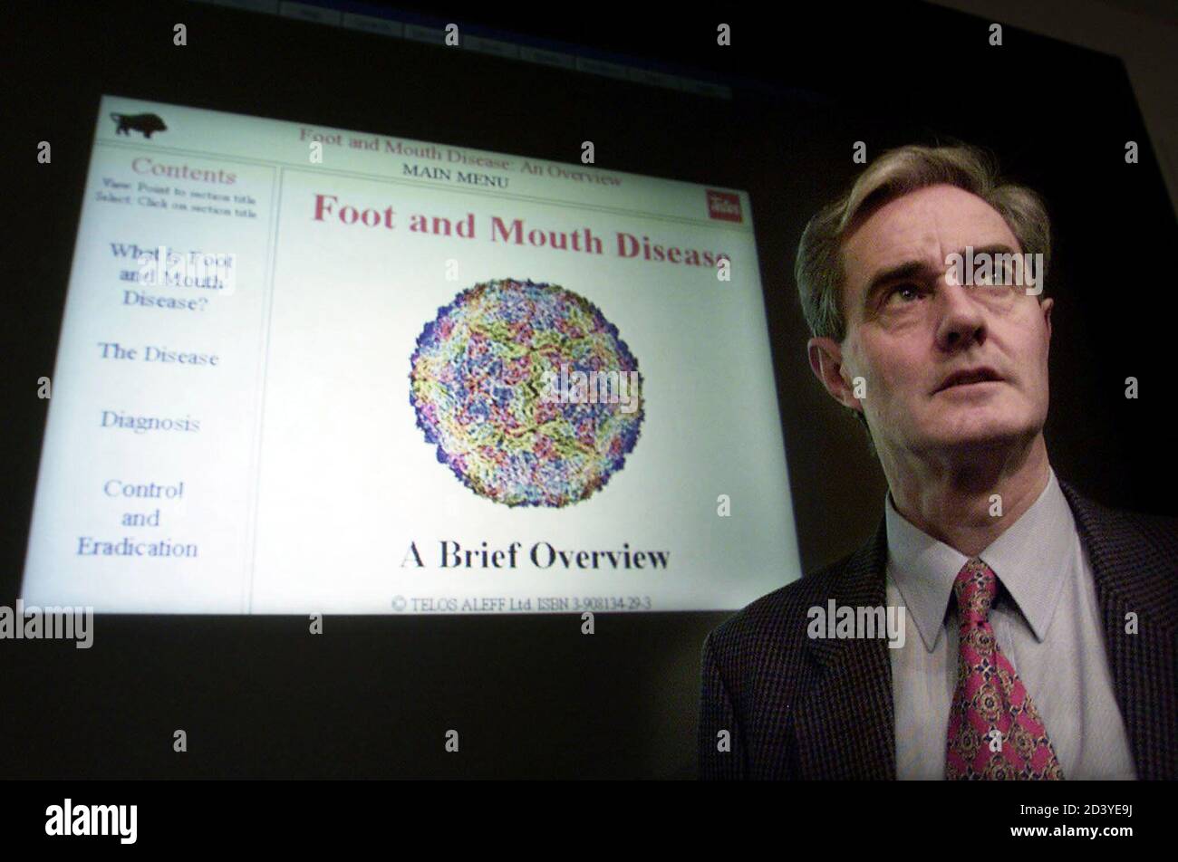 Dr Alex Donaldson from the Institute of Animal Health addresses MP's and  the media infront of a Crystalographic X-Ray of the Foot and Mouth Virus in  London March 23, 2001. Scientists advising
