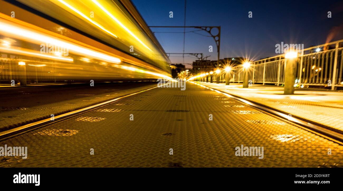 metro vehicle passing through Dom Luis I bridge in Porto, Portugal Stock Photo