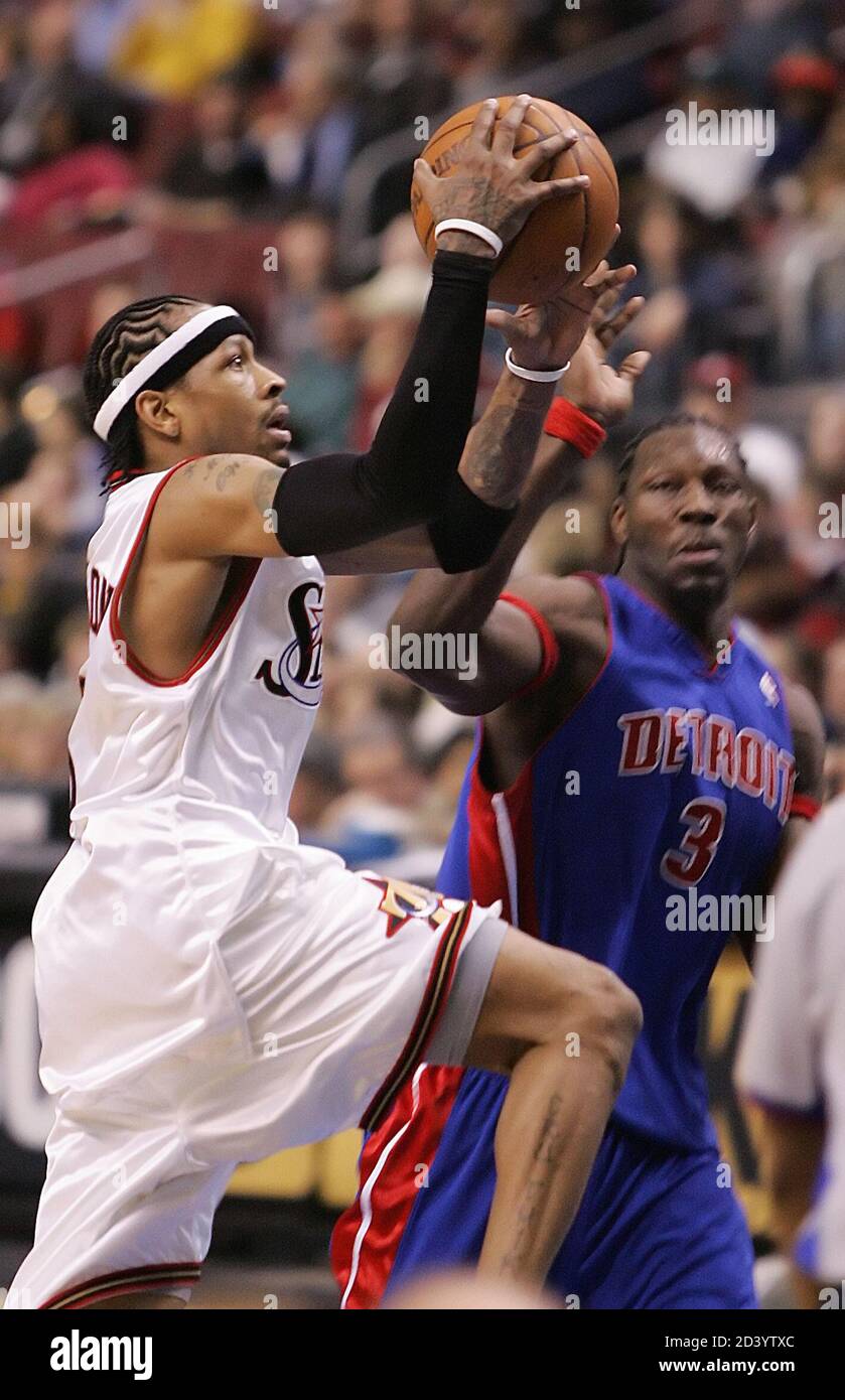 Philadelphia 76ers guard Allen Iverson (L) heads to the hoop as the Detroit  Pistons center Ben Wallace defends during third quarter NBA action in  Philadelphia, March 23, 2005. Iverson led all scorers