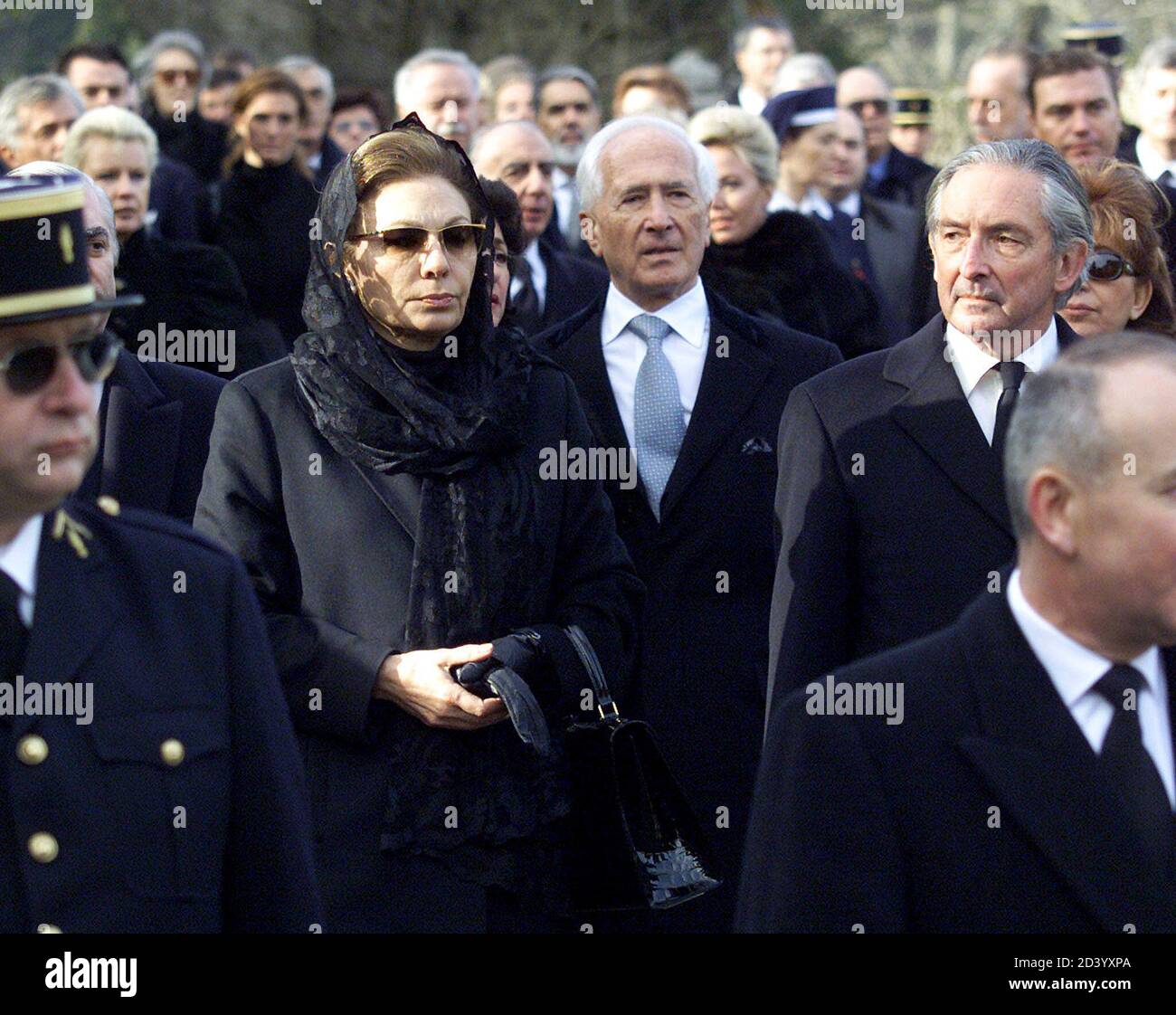 Iran's Empress Farah Diba (C Left) arrives with guests for the funeral service for Italy's last Queen Maria Jose at the Hautecombe Abbey, February 2, 2001. Maria Jose was Italy's last queen, who with her husband Umberto II ruled for only 27 days before a referendum introduced the Italian republic on June 2, 1946. Maria Jose was born in 1906 at Ostend, Princess Maria Jose Charlotte Henrietta Gabriella of Saxony-Coburg, the daughter of King Albert and Queen Elizabeth of the Belgians.  RP/JES/CRB Stock Photo