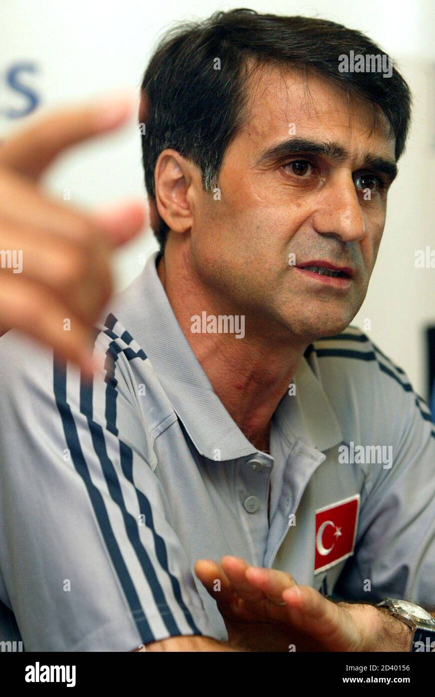 Turkey head coach Senol Gunes speaks during a news conference in Hong Kong May 22, 2002. Turkey is drawn in group C with [Brazil, China and Costa Rica] for the 2002 FIFA World Cup Finals starting May 31. Stock Photo