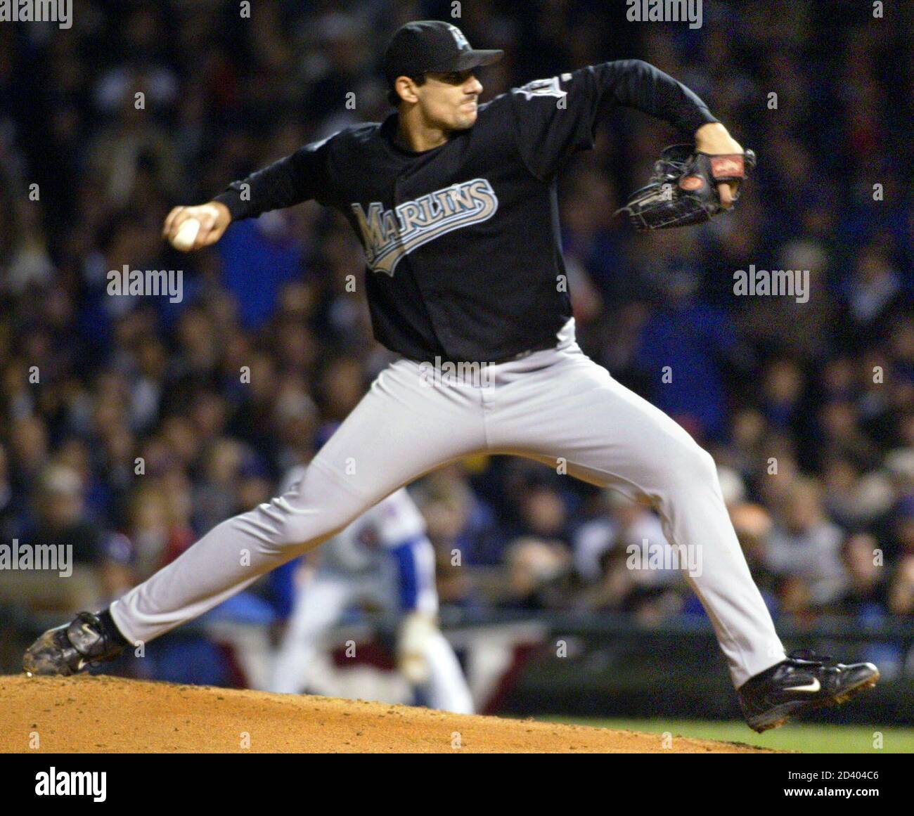 Florida Marlins starter Carl Pavano delivers a pitch to Chicago Cubs batter  Sammy Sosa during the first inning of play in Game 6 of their NLCS  Championship series at Wrigley Field in