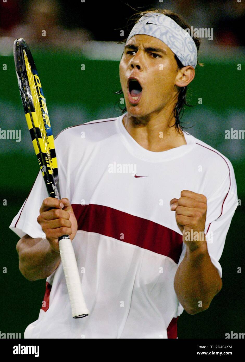 spains-rafael-nadal-reacts-during-his-third-round-match-against-australias-lleyton-hewitt-at-the-australian-open-tennis-championship-in-melbourne-january-24-2004-hewitt-won-the-match-7-6-7-6-6-2-reutersdavid-gray-cptw-2D404XM.jpg