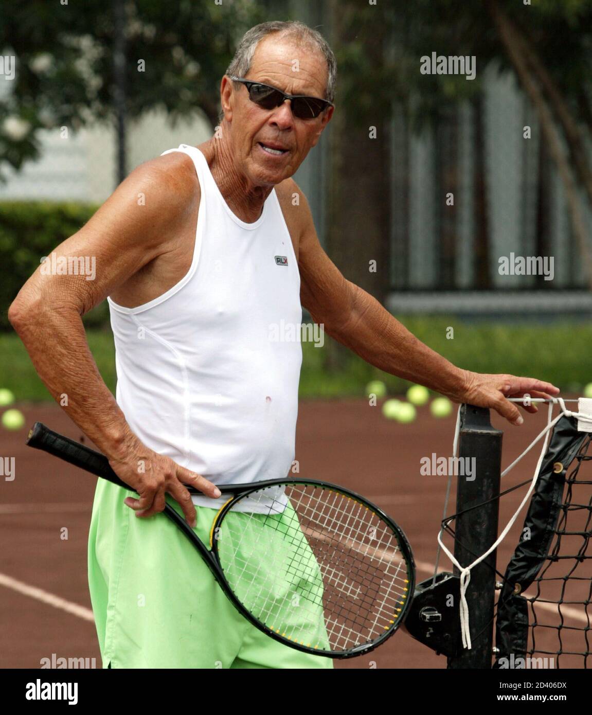 Nick Bollettieri gives instructions during practice with his students at  the Nick Bollettieri Tennis Academy in Bradenton, Florida in July 12, 2004. Bollettieri  Academy as trained past champions [Andre Agassi, Monica Seles,