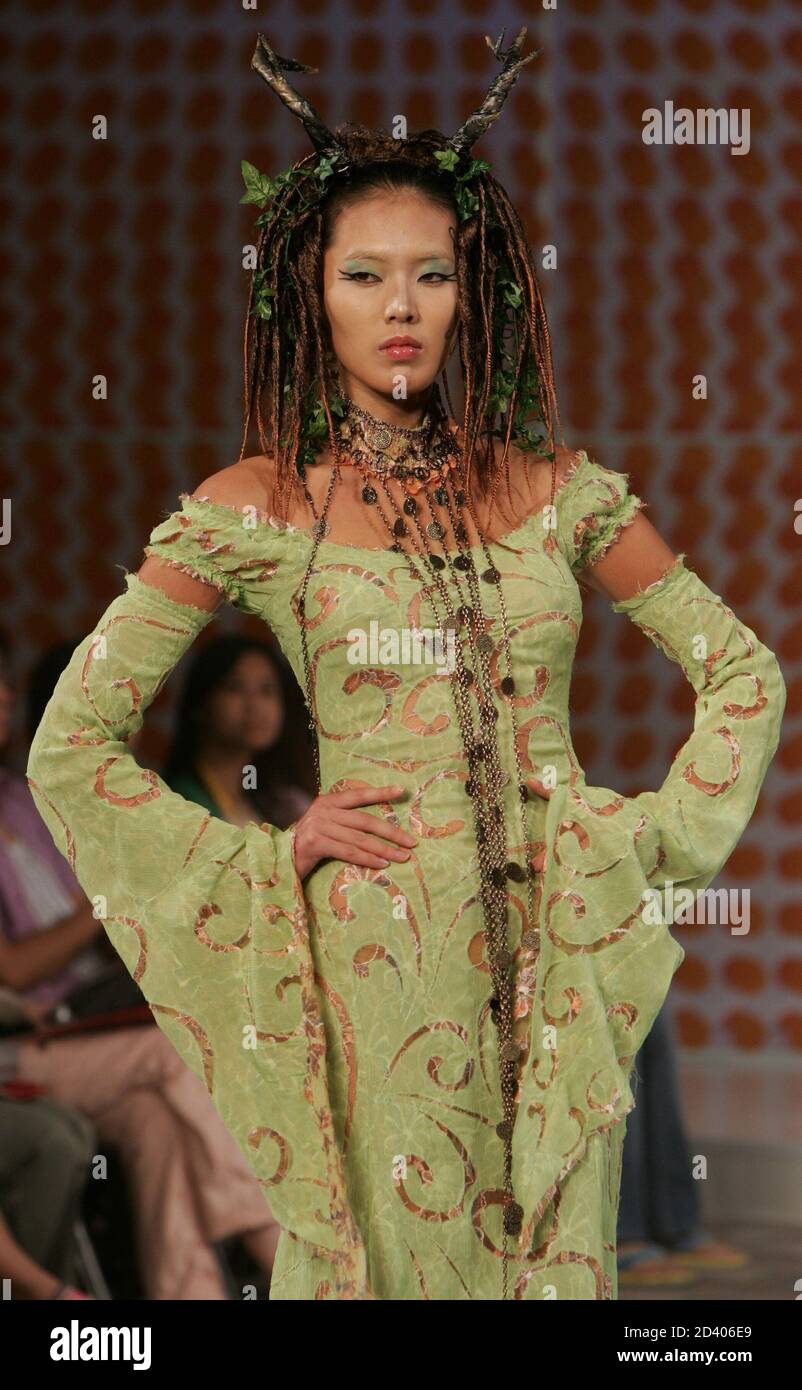A model presents a creation of Hong Kong designer Ika Butoni during the Hong Kong Fashion Week for Spring/Summer 2005 in Hong Kong July 13, 2004. Stock Photo
