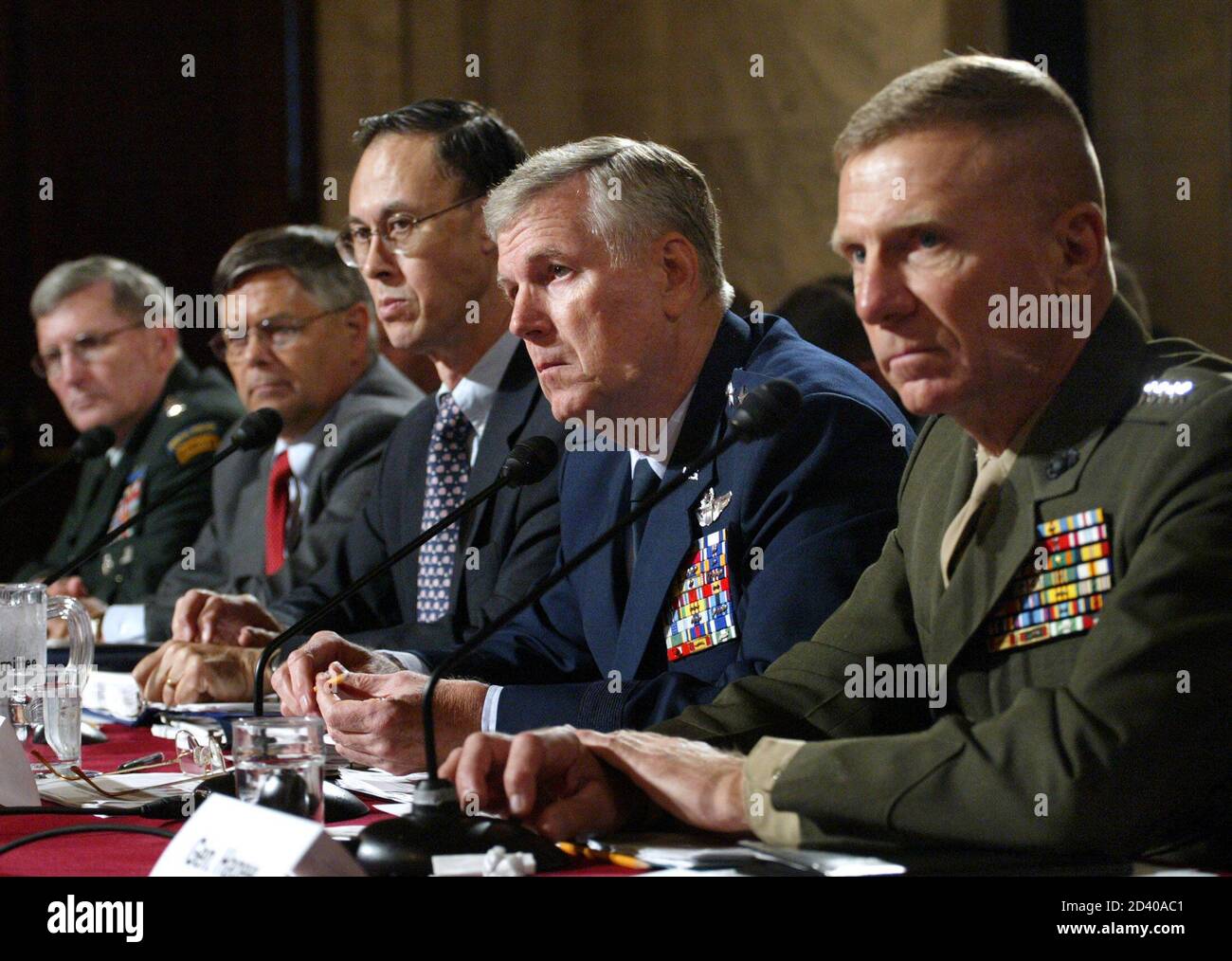 (Left to right) U.S. Army Gen. Peter Schoomaker, Principal Deputy Undersecretary of Defense for Personnel and Readiness Charles Abell, Undersecretary of Defense for Personnel and Readiness, David Chu, General Richard Myers, Chief of Staff, and Commandant, U.S. Marine Corps Gen. Michael Hagee testify at a hearing on fighting the global war on terrorism at the Senate Armed Services Committee on Capitol Hill in Washington D.C., June 30, 2005. REUTERS/Yuri Gripas YG/KS Stock Photo