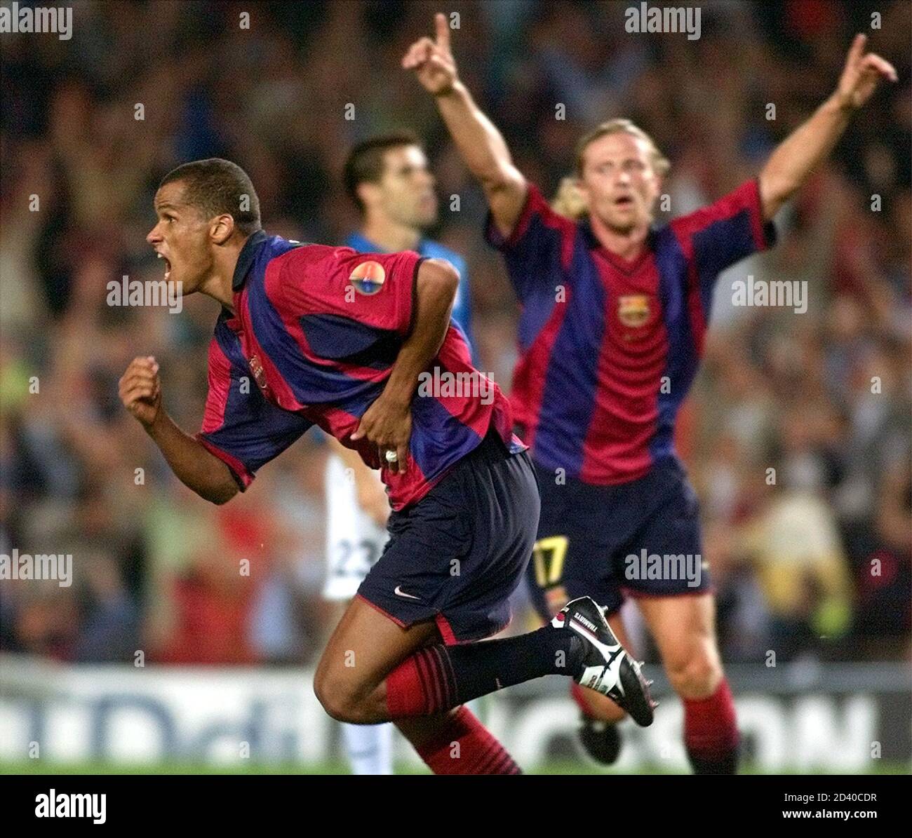 Fc Barcelona S Brazilian Player Rivaldo L And French Player Enmmanuel Petit R Celebrate After Rivaldo Scored During Their Spanish First Division Soccer Match In Barcelona Nou Camp Stadium June 17 2001 Rivaldo S