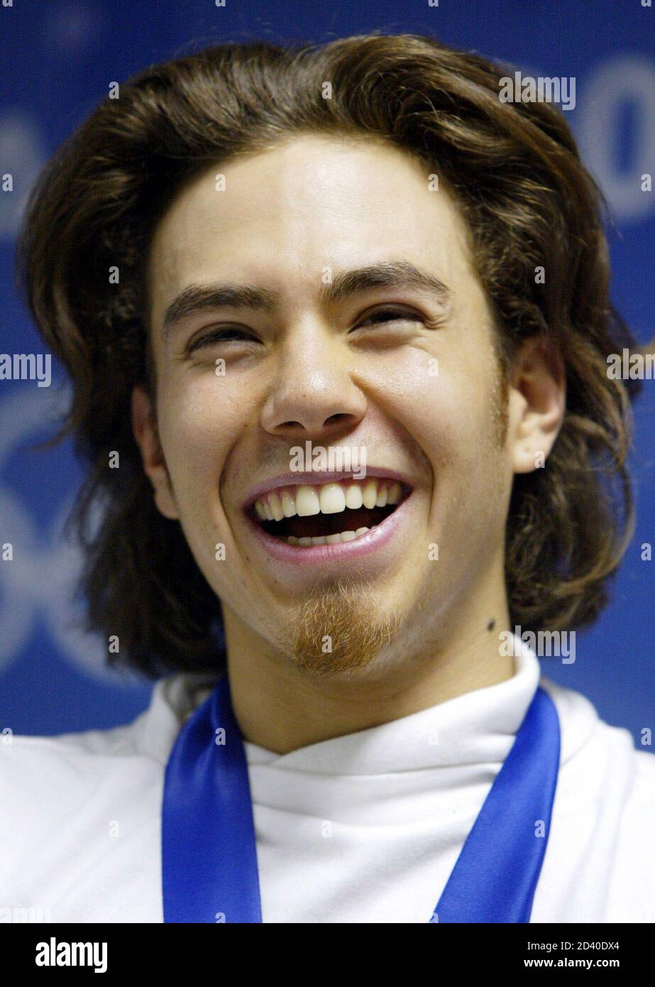 Apolo Anton Ohno Of The United States Smiles After Receiving The Gold Medal He Won In The Men S 1500m Short Track Final At The Salt Lake 02 Olympic Winter Games February