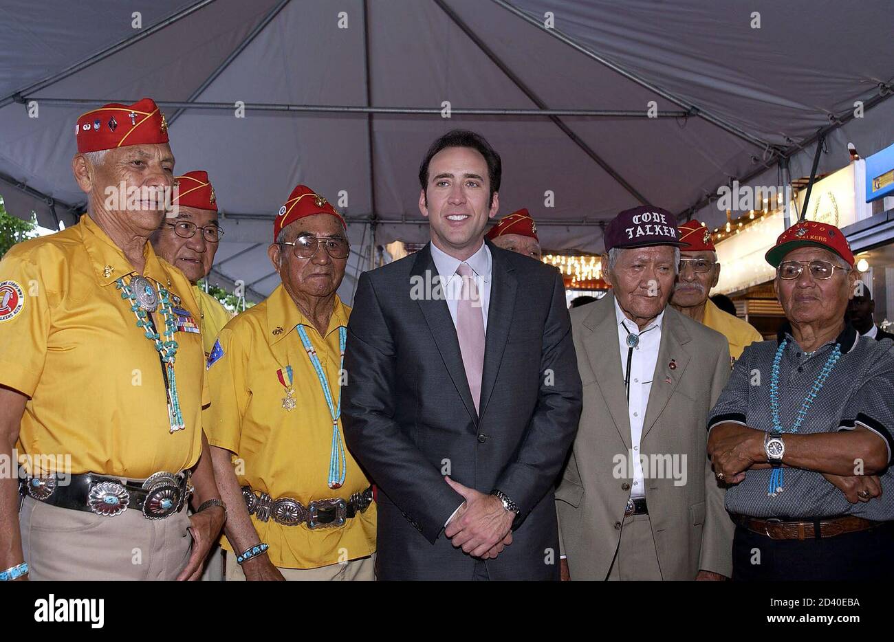 Actor Nicolas Cage (center) poses with original Navajo American Code Talkers  at the world premiere of MGM's "Windtalkers," in Washington, D.C., June 4,  2002. "Wintalkers" is based on a the true story