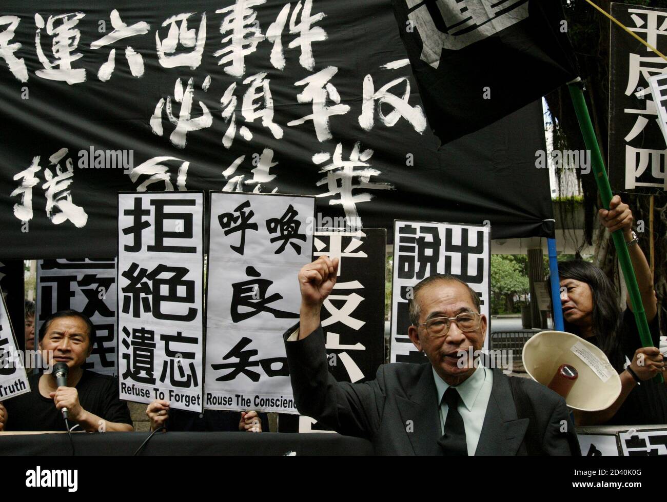 Szeto Wah A Pro Democracy Lawmaker And Chairman Of Hong Kong Alliance In Support Of Patriotic Democratic Movements In China Chants Slogans With Other Activists Outside The Legislative Council In Hong Kong May
