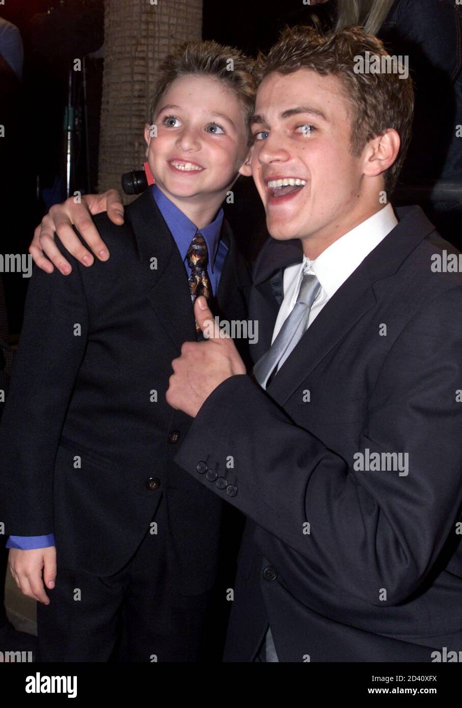 Canadian actor Hayden Christensen (R) star of the new drama film " Life As  A House" poses with his young co-star Mike Weinberg at the film's premiere  October 24, 2001 in Hollywood.