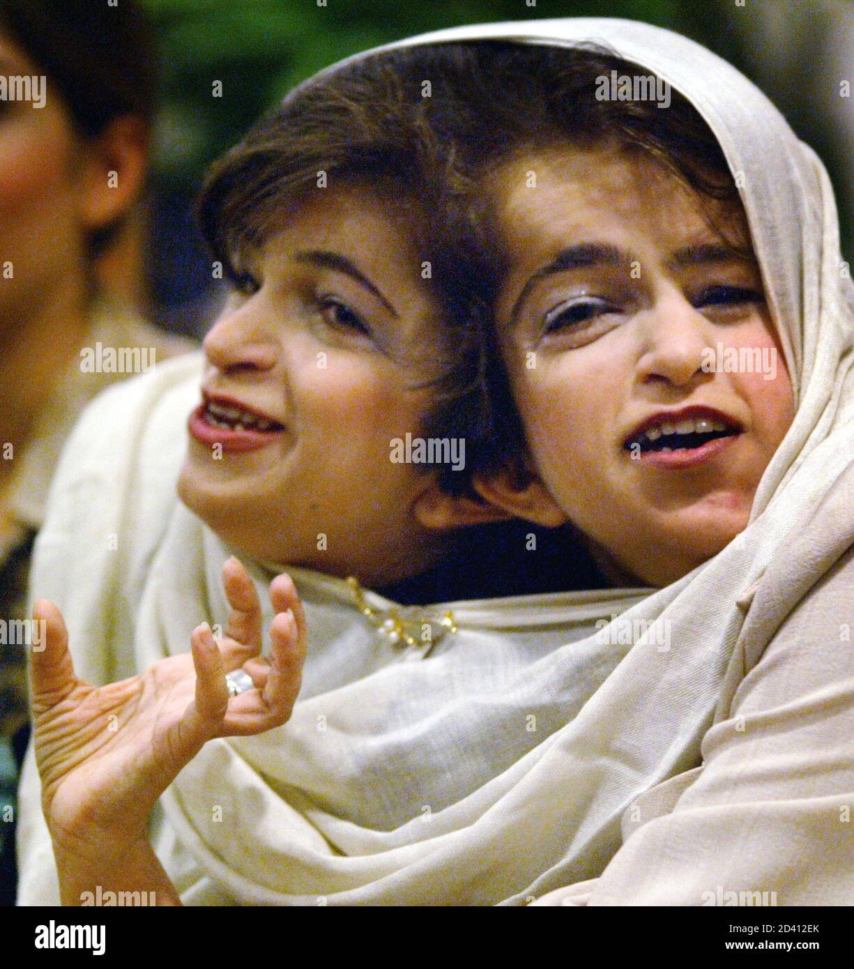Ladan L And Laleh Bijani A Pair Of Conjoined Twins From Iran Attend A News Conference At Raffles Hospital In Singapore June 11 2003 Doctors In Singapore Will Try To Make Medical