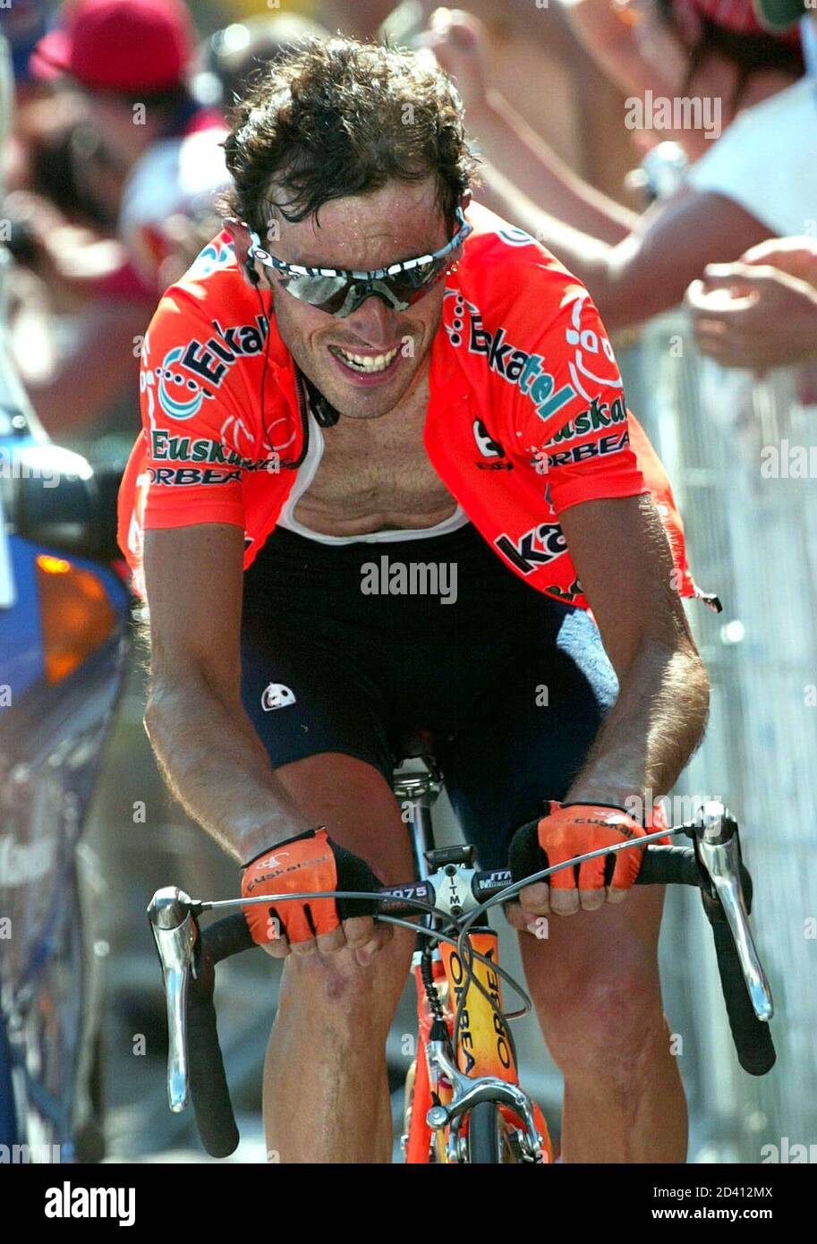 Euskatel team riders Iban Mayo of Spain rides on his way to win the 219km  eighth stage of the Tour de France cycling race between Sallanches and Alpe  d'Huez July 13, 2003.