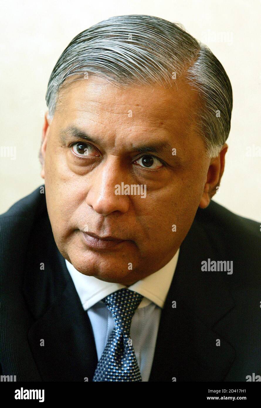 Pakistani Prime Minister Shaukat Aziz listens during an interview 