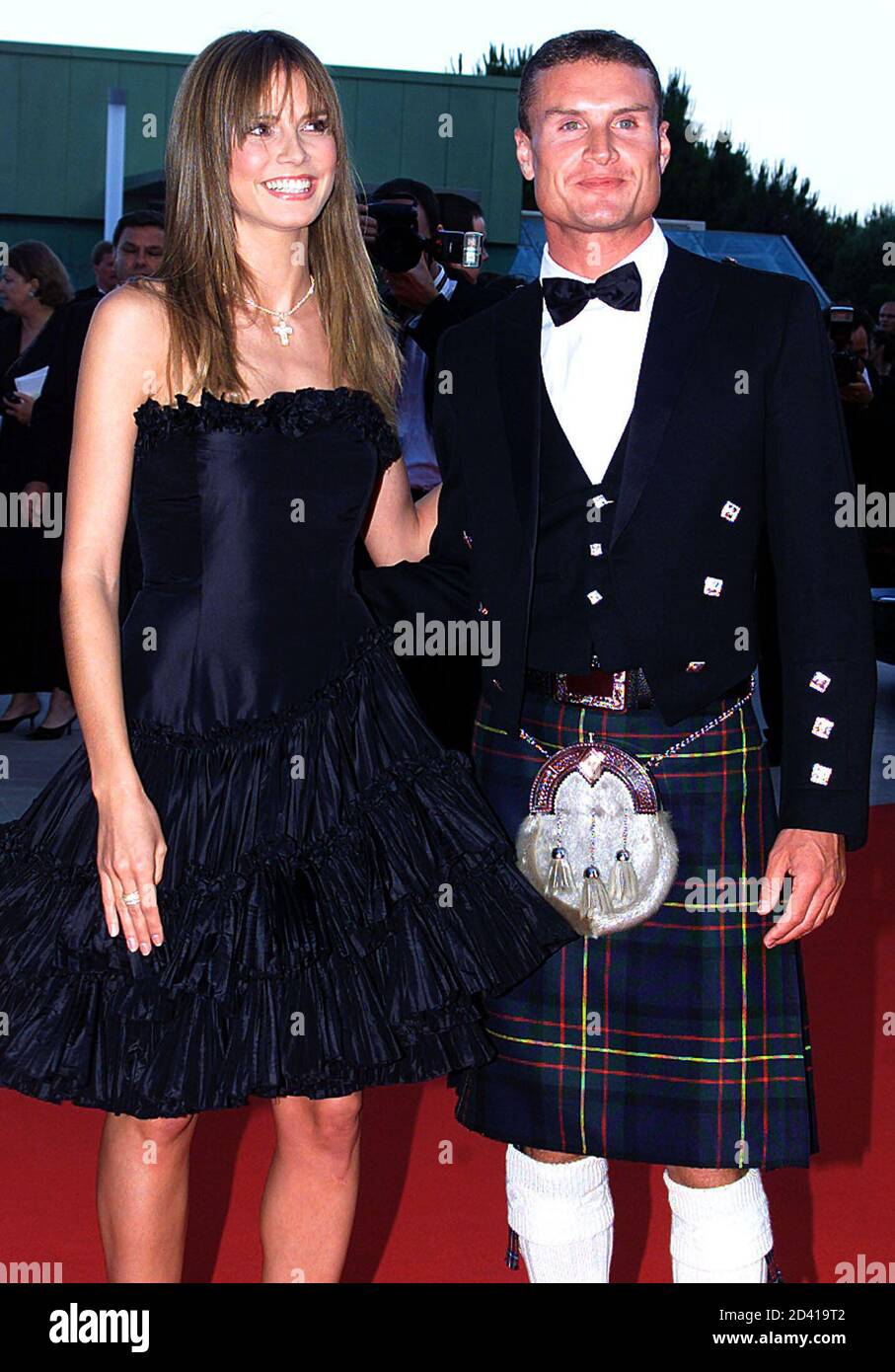 Scottish Formula One driver David Coulthard (R) and German top model Heidi Klum (L) arrive at the Laureus Sports Awards ceremony in Monaco, May 22, 2001. This annual ceremony celebrates sporting excelence across all disciplines and all continents. Stock Photo