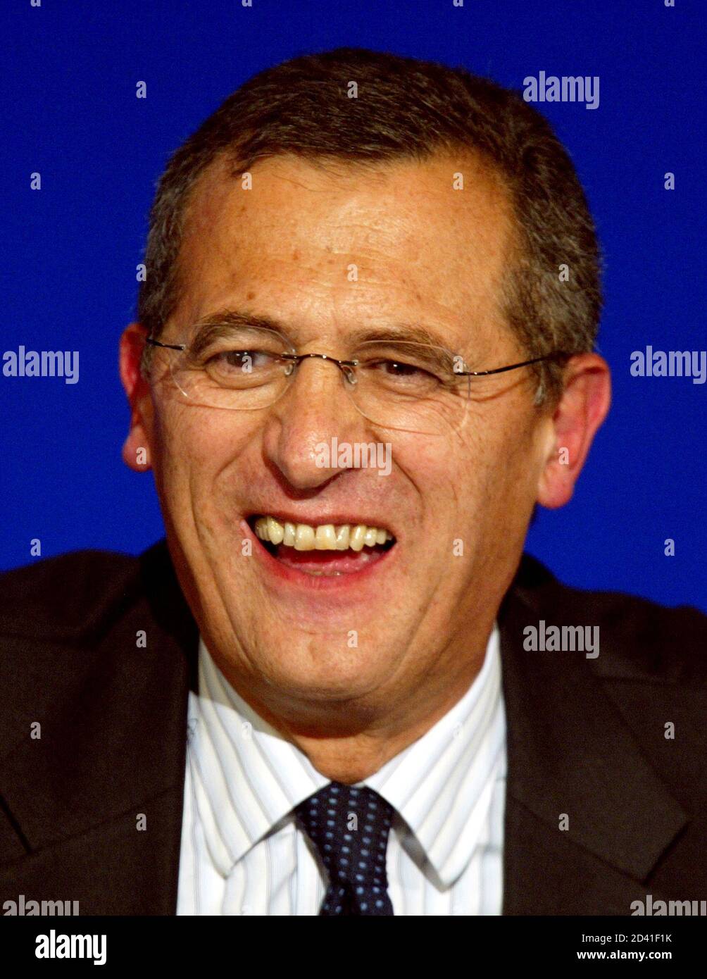 Air France Chairman Jean-Cyril Spinetta answers newsmen during a press  conference at Roissy, northern Paris, September 30, 2003. [Air France and  KLM unveiled plans to create Europe's biggest airline in an all-share