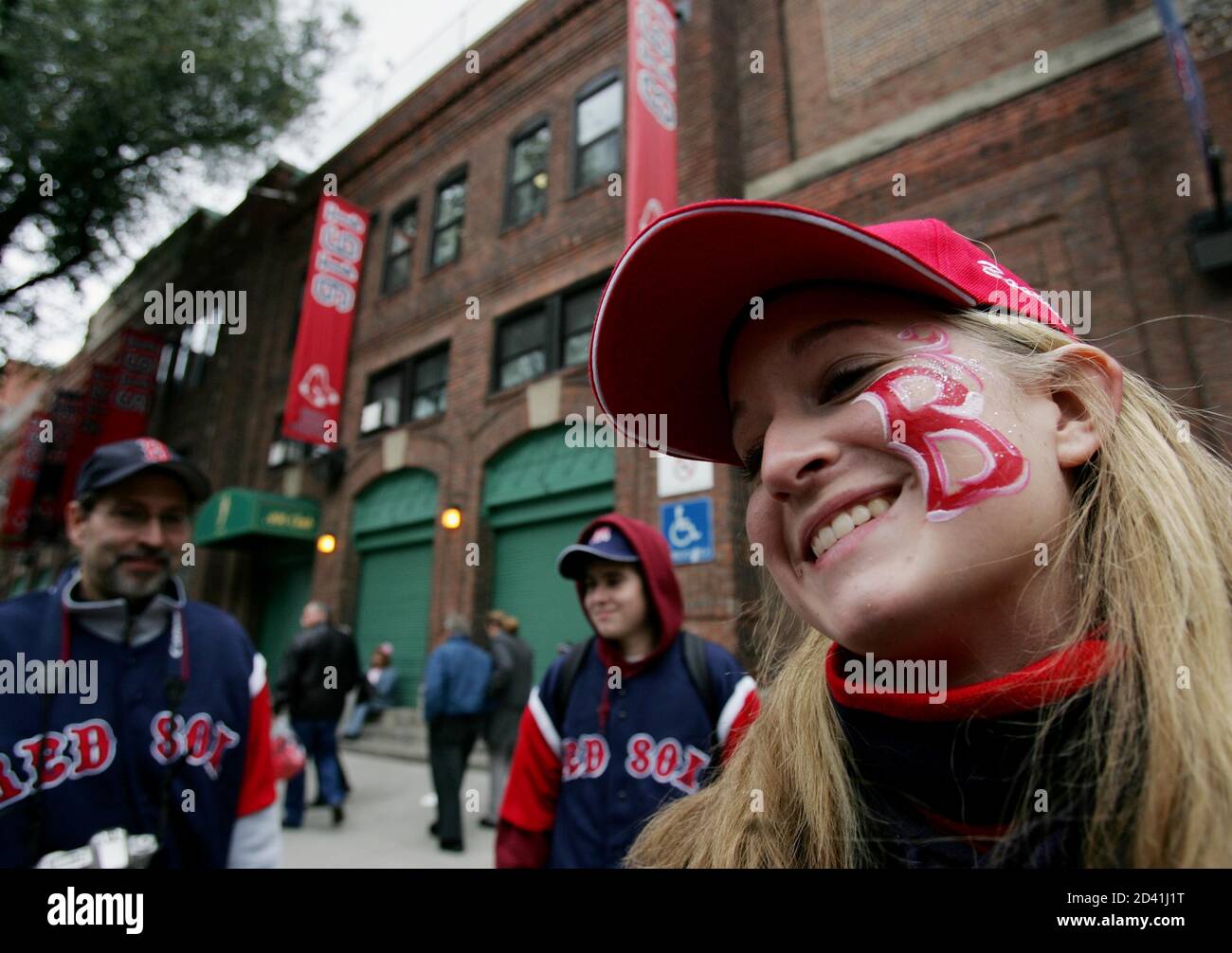 Boston Red Sox fan Bridget Correia displays her painted face before Game 1  of the World Series between the Red Sox and St. Louis Cardinals at Fenway  Park in Boston on October