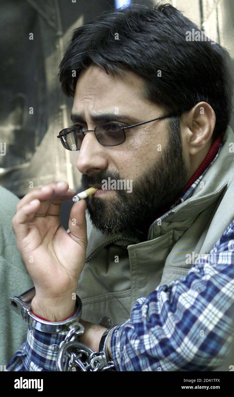 Handcuffed And Police Van High Resolution Stock Photography and Images