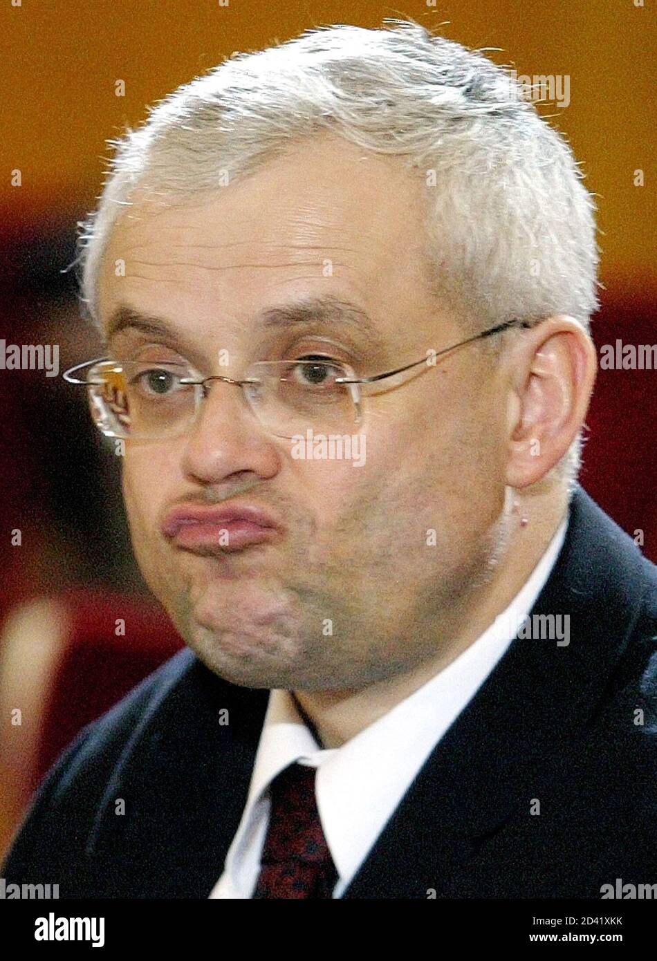 Czech Prime Minister Vladimir Spidla grimaces at the end of the parlimentary session to elect Vaclav Havel's successor ended at Prague Castle January 24,2003. The second Czech parliamentary attempt to elect Havel's successor ended in a political stalemate. Former right-wing Prime Minister Vaclav Klaus obtained 127 votes and was short by 14 votes to gain the parliamentary majority and his opponent, senator Jaroslava Moserova received 65 votes. REUTERS/Petr Josek  PJ Stock Photo