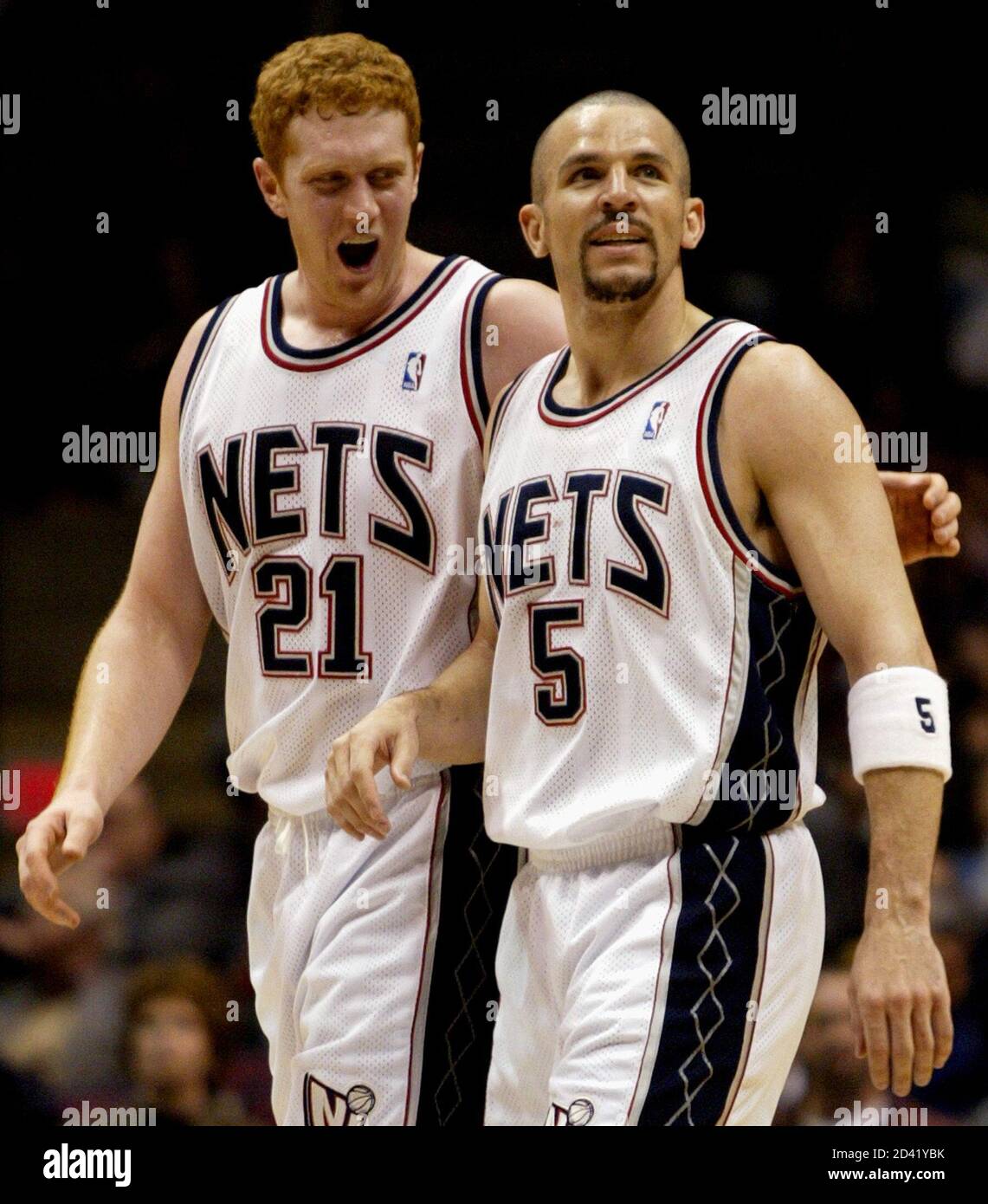 New Jersey Nets forward Brian Scalabrine (L) reaches out to hug guard Jason  Kidd as they are removed from their NBA game with Houston Rockets late in  the fourth quarter in East