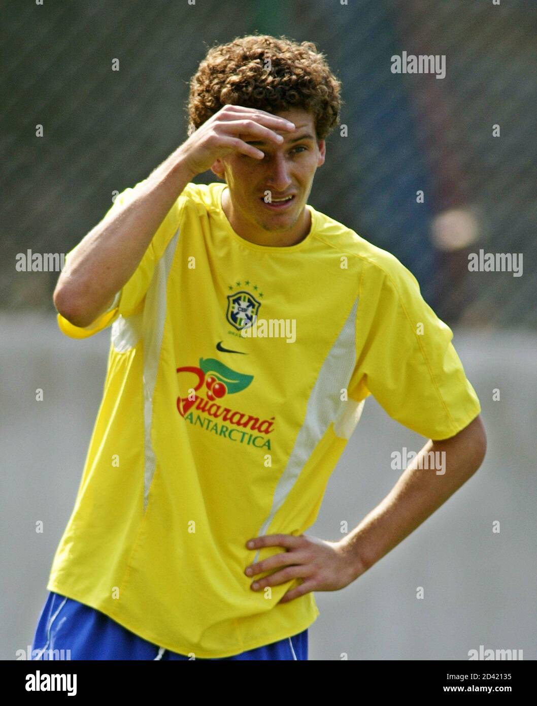 Brazilian player Elano looks on during a training session, January 13,  2004. Elano could play the second leg of the tournament after suffering an  injury to his left foot, during the match