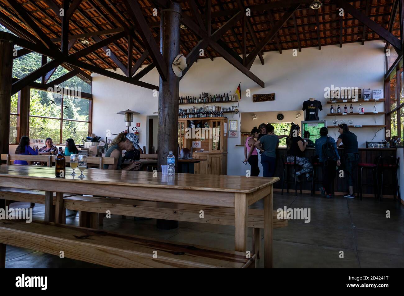 The dining hall of Wolkenburg brewery where costumers can buy and enjoy the local produced beer and also the german cuisine food. Stock Photo