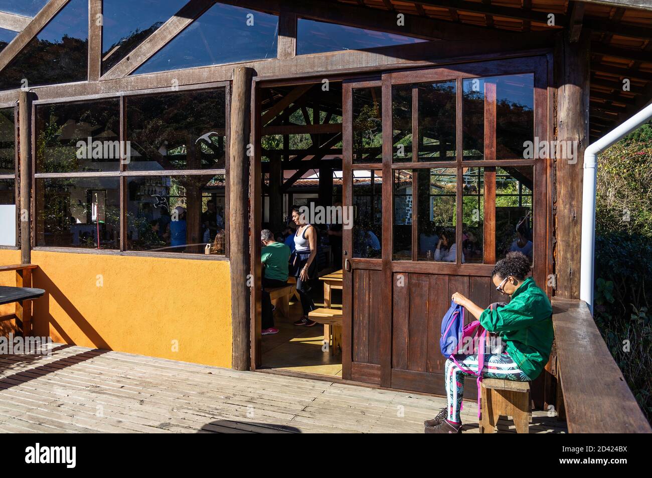 The outdoor porch located at the back of the dining hall of Wolkenburg brewery, where costumers can enjoy the stunning view outside. Stock Photo