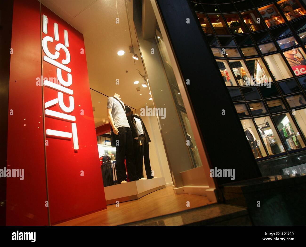 Men's apparel is displayed inside a major Esprit store in Hong Kong's  Causeway Bay shopping district February 23, 2005. Global fashion retailer Esprit  Holdings Ltd. posted on Wednesday a stronger-than-forecast 76 percent
