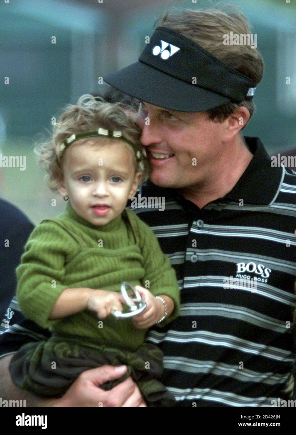 Phil Mickelson Of Scottsdale Arizona Hugs His 16 Month Old Daughter Amanda After Winning The Tour Championship At East Lake Golf Club In Atlanta Georgia On November 5 00 Mickelson Finished At 13