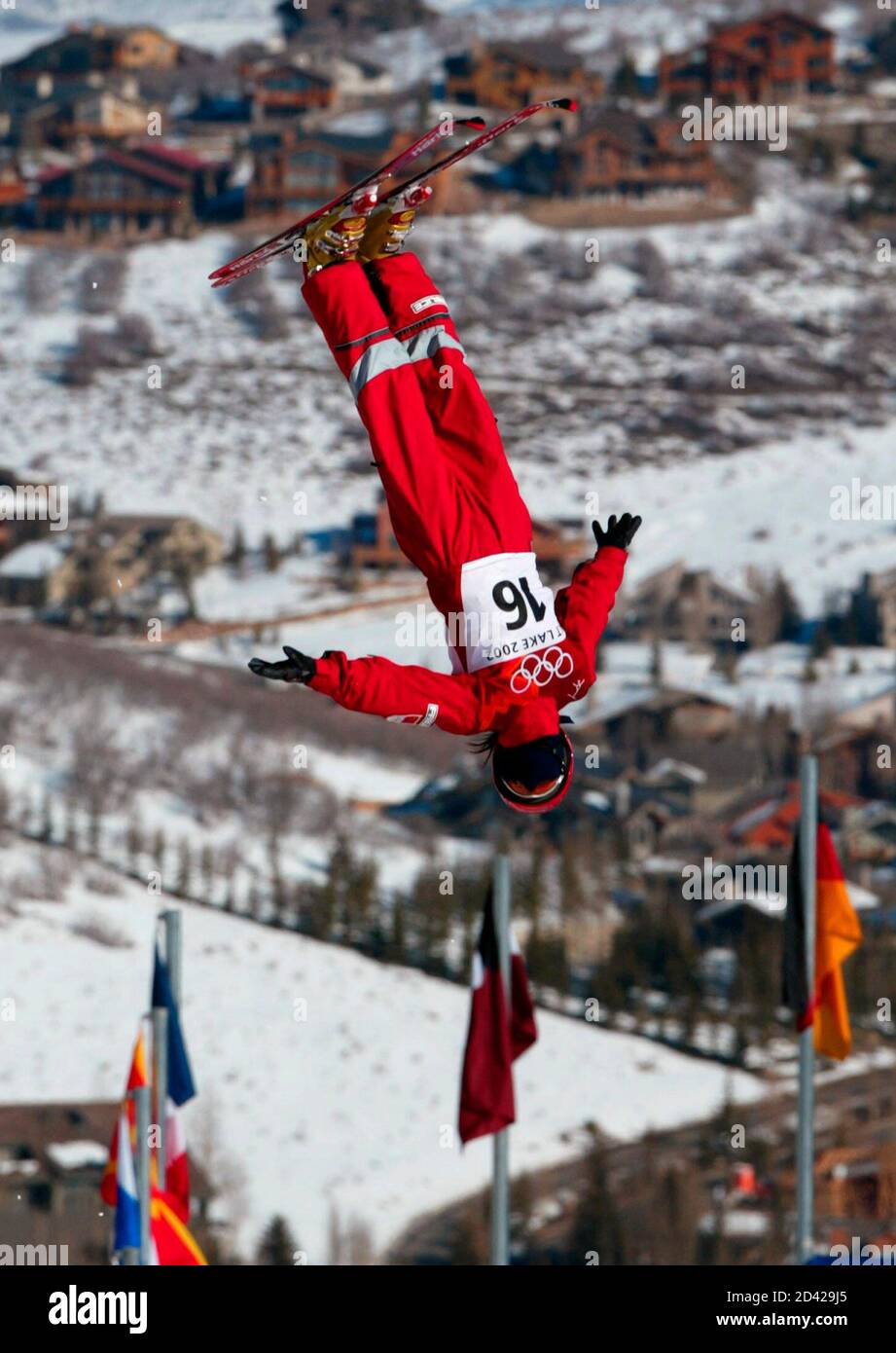 Nina Li of China twists through her jump during the qualifying round in  women's freestyle skiing aerials at the Salt Lake 2002 Olympic Winter Games  in Deer Valley, February 16, 2002. The