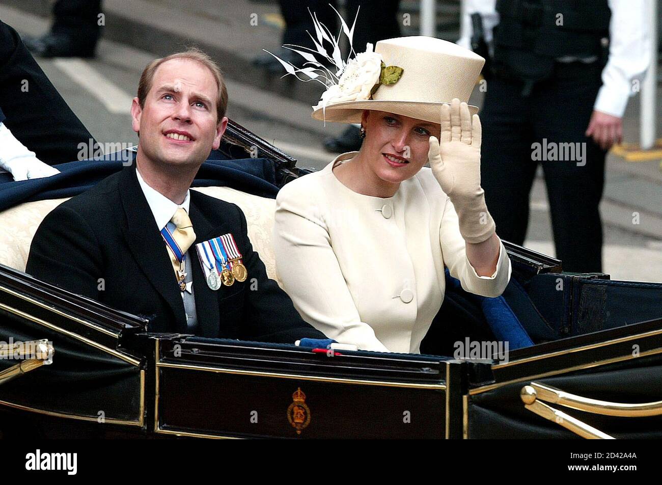 britains-earl-l-and-countess-of-wessex-wave-to-the-crowds-en-route-to-st-pauls-cathedral-for-the-golden-jubilee-service-of-thanksgiving-in-london-june-4-2002-thousands-of-people-gathered-in-central-london-for-the-festivities-on-the-final-day-of-the-celebratory-weekend-marking-the-queens-50th-year-on-the-throne-reutersstephen-hird-shnmb-2D42A4A.jpg