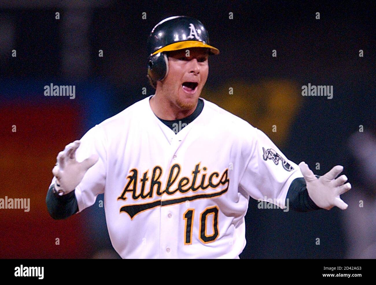 Oakland Athletics' Scott Hatteberg celebrates after hitting a game-winning  home run against the Kansas City Royals during the 9th inning at the  Network Associates Coliseum in Oakland, Calif. September 4, 2002. The