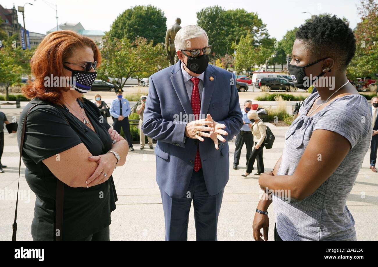 St. Louis, United States. 08th Oct, 2020. Missouri Governor Mike Parson speaks with police widows, Sgt. Ann Marie Dorn (L) and Alexis Bohannon, during an event for Backstoppers at the Civil Courts Building in St. Louis on October 8, 2020. Dorn's husband, retired St. Louis Police Captain David Dorn, was shot and killed during protests on June 2, 2020, protecting a pawn shop, while officer Tamarris Bohannon was shot and killed on August 30, 2020 after responding to a shooting call. Photo by Bill Greenblatt/UPI Credit: UPI/Alamy Live News Stock Photo