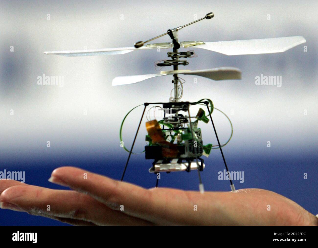 Seiko Epson Corporation's advanced model of the "world's lightest micro-flying  robot" prototype iFR-II is unveiled at a test demonstration in Tokyo August  18, 2004. Featuring Bluetooth wireless control, independent flight, and the  "
