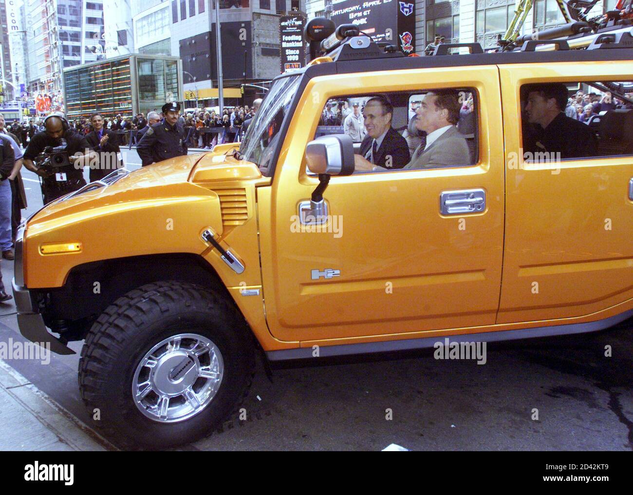 Actor Arnold Schwarzenegger drives a new Hummer H2 SUT (Sport Utility  Truck) over a curb in New York on April 10, 2001 at the world premier of  the concept vehicle. The Hummer