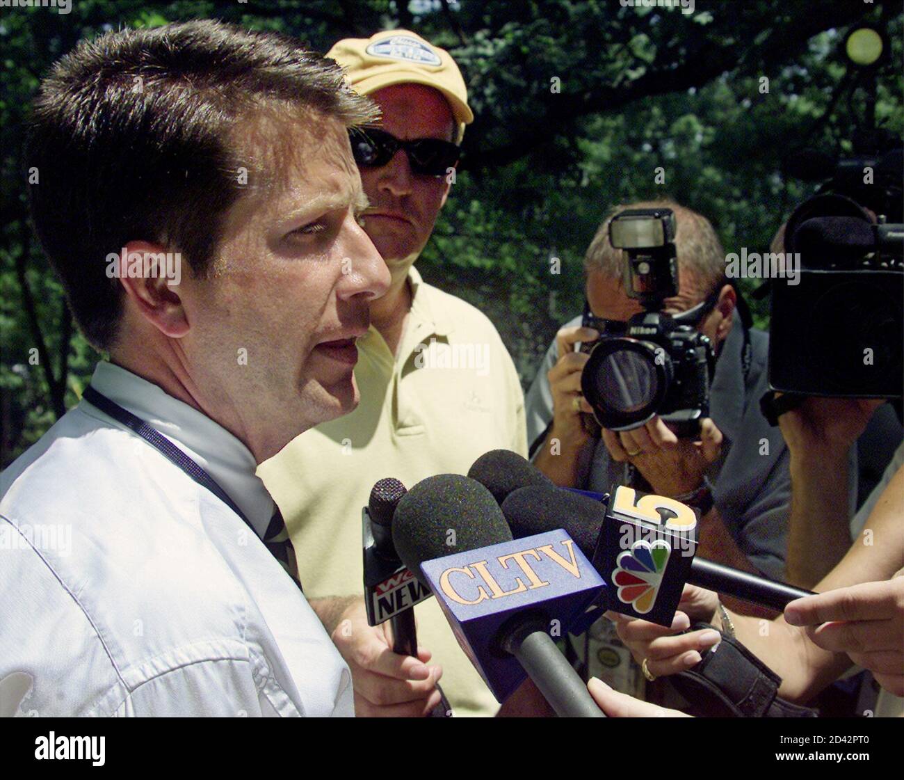 John Kaczkowski, Western Golf Association tournament director, speaks with the media at Cog Hill Golf and Country Club in the Chicago suburb of Lemont, Illinois, July 2, 2002, concerning the withdrawal of Tiger Woods from the 2002 Advil Western Open. The Advil Western Open begins here July 4. REUTERS/Sue Ogrocki  SUE Stock Photo