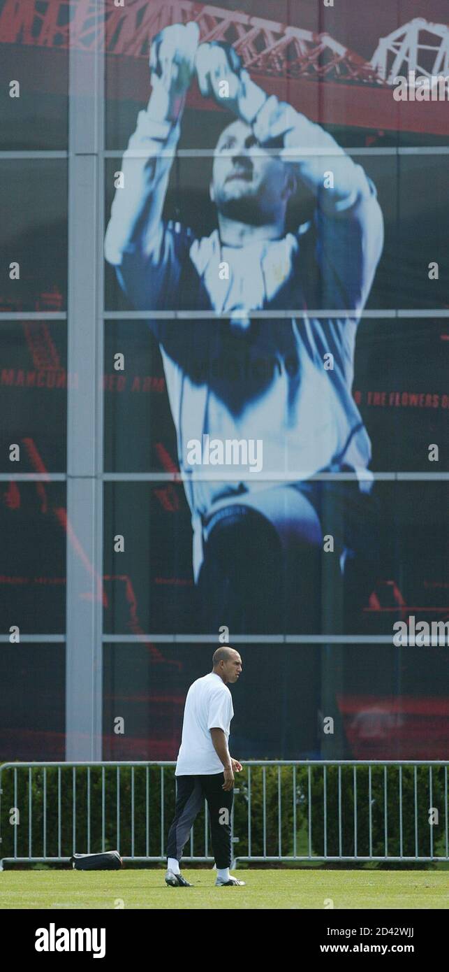 American goalkeeper Tim Howard warms up during Manchester United training  at Nike Village headquarters, Portland, Oregon, USA, July 24, 2003. Behind  is a large advertisement with an image of Manchester United first-choice