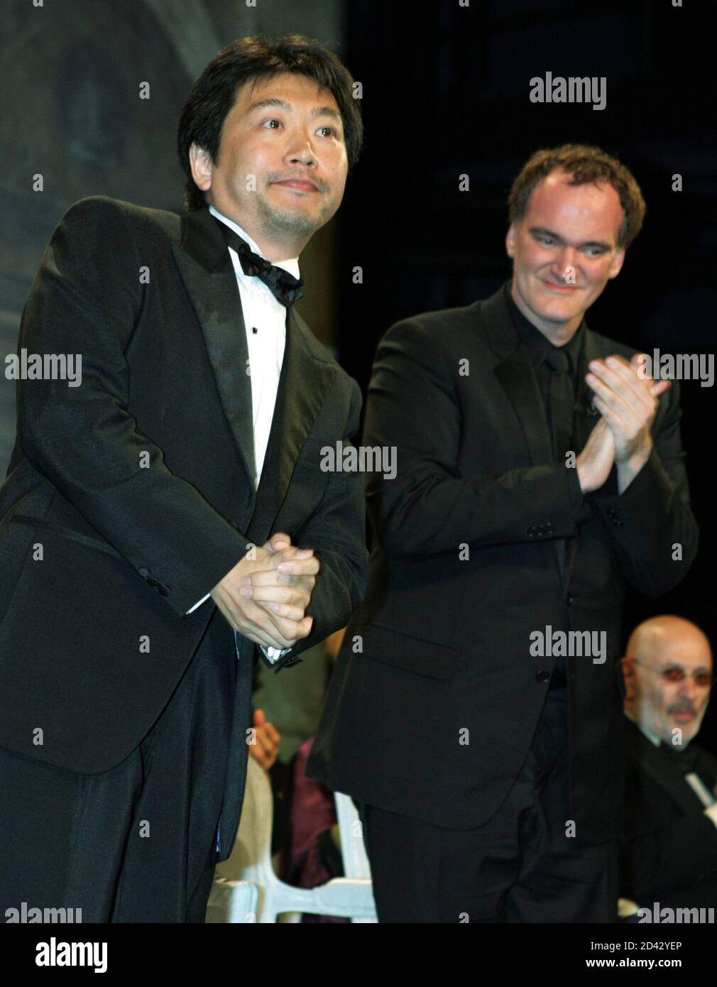 Japanese Director Kore Eda Hirokazu Receives The Best Actor Award On Behalf Of Yagira Yuya For The Film Nobody Knows During The Awards Ceremony At The 57th Cannes Film Festival Japanese Director Kore Eda