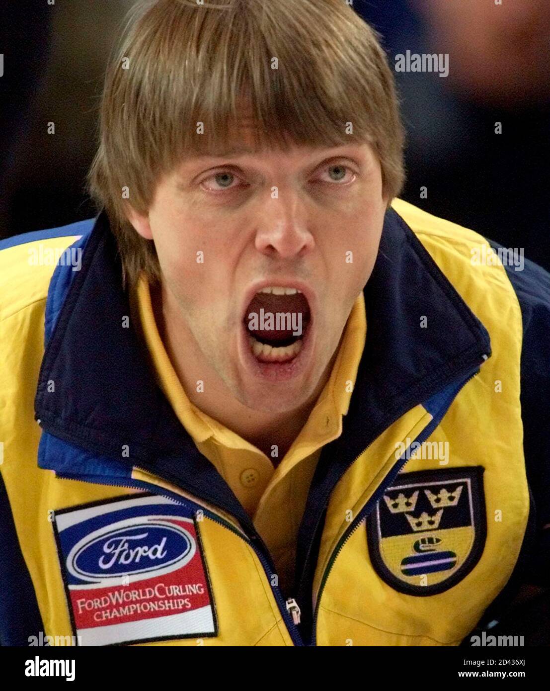 Swedish skip Per Carlsen shouts to his sweepers during opening round play  at the World Curling Championships in Bismarck, North Dakota, April 6,  2002. Sweden lost their opening game 6-4 to Finland.