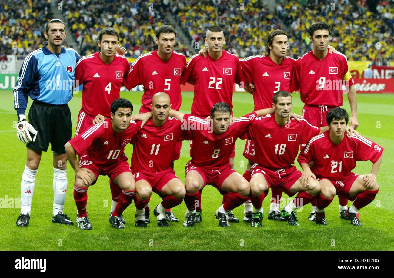 Turkey pose for a team picture before the start of a World Cup semi-final  match with Brazil in Saitama June 26, 2002. Front row (L to R) are,  Yildiray Basturk, Hasan Sas,