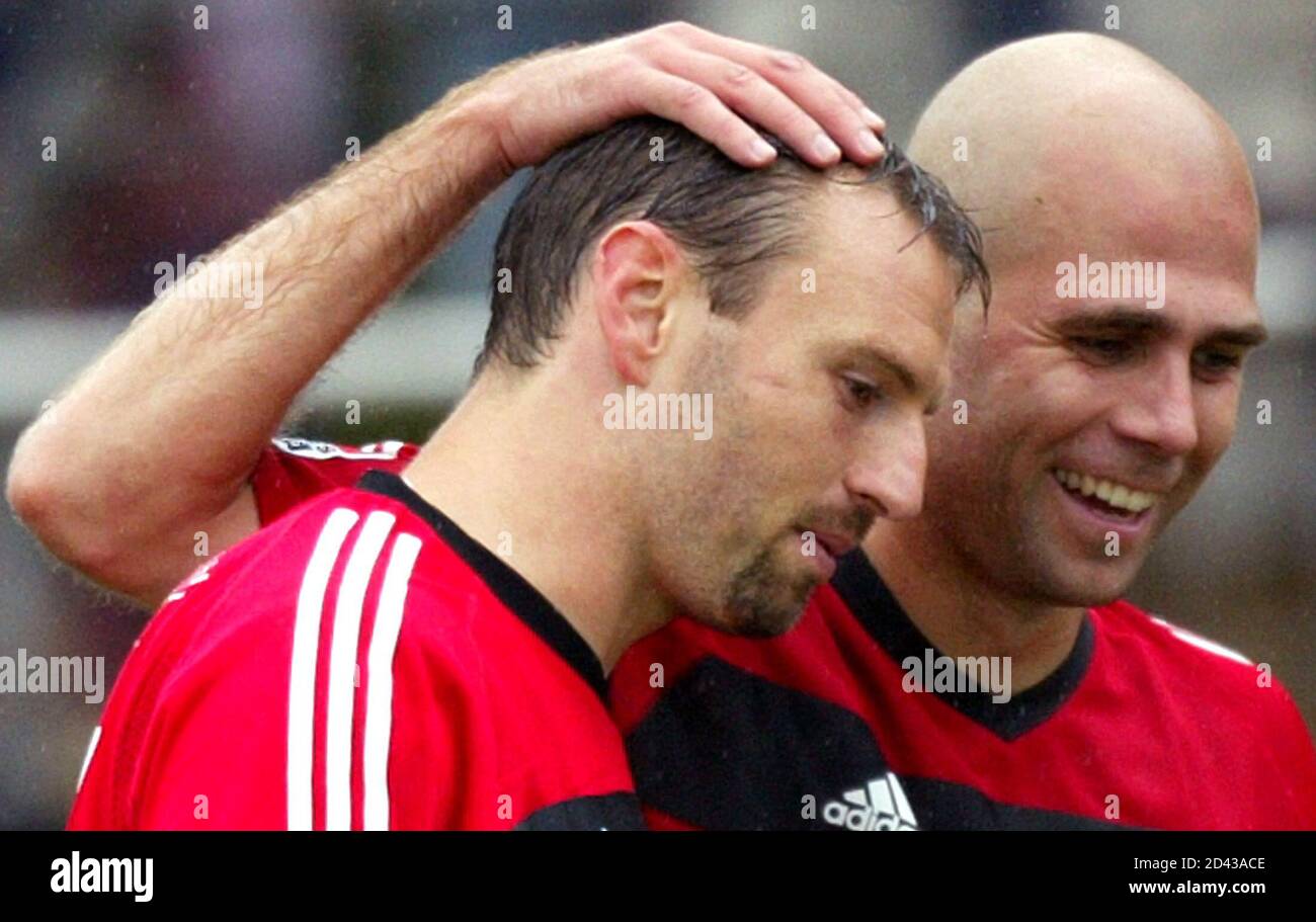 Jens Nowotny L And Teddy Lucic From German First Division Soccer Club Bayer Leverkusen Leave The