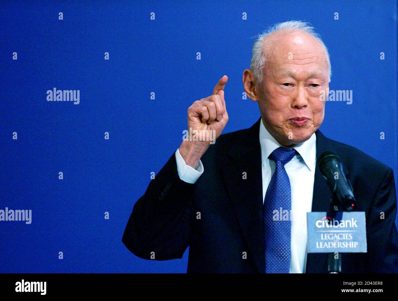 Singapore's Minister Mentor Lee Kuan Yew speaks during a business luncheon organised by Citibank in Hong Kong March 30, 2005. [Lee is the first Singaporean leader to meet acting Hong Kong leader Donald Tsang after former chief executive Tung Chee-hwa quit earlier this month.] Stock Photo