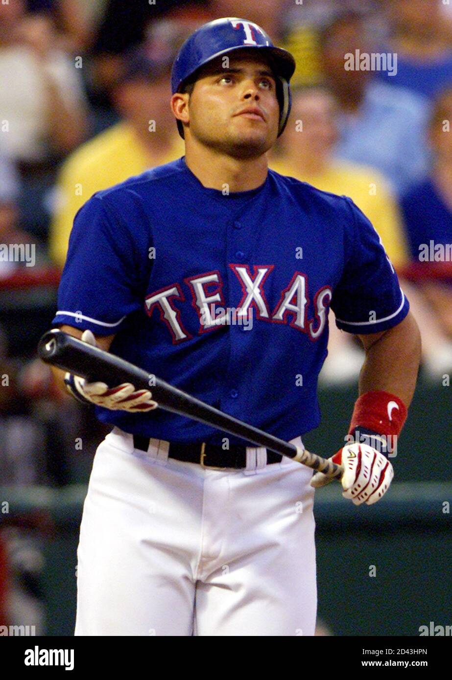Texas Rangers Catcher Ivan Pudge Rodriguez Watches A Foul Ball From The Batter S Box During Second Inning Action Against The Seattle Mariners At The Ballpark In Arlington July 2 2001 Rodriguez Was