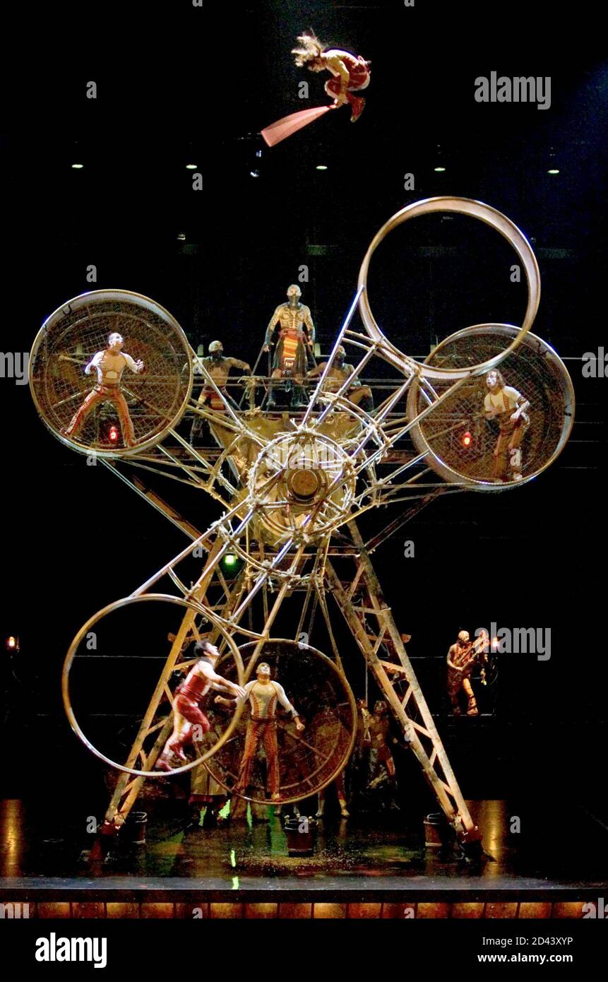 Acrobats perform on the "Wheel of Death" in a scene from the new Cirque du  Soleil show "Ka" at the MGM Grand in Las Vegas, Nevada February 2, 2005.  "Ka" combines martial