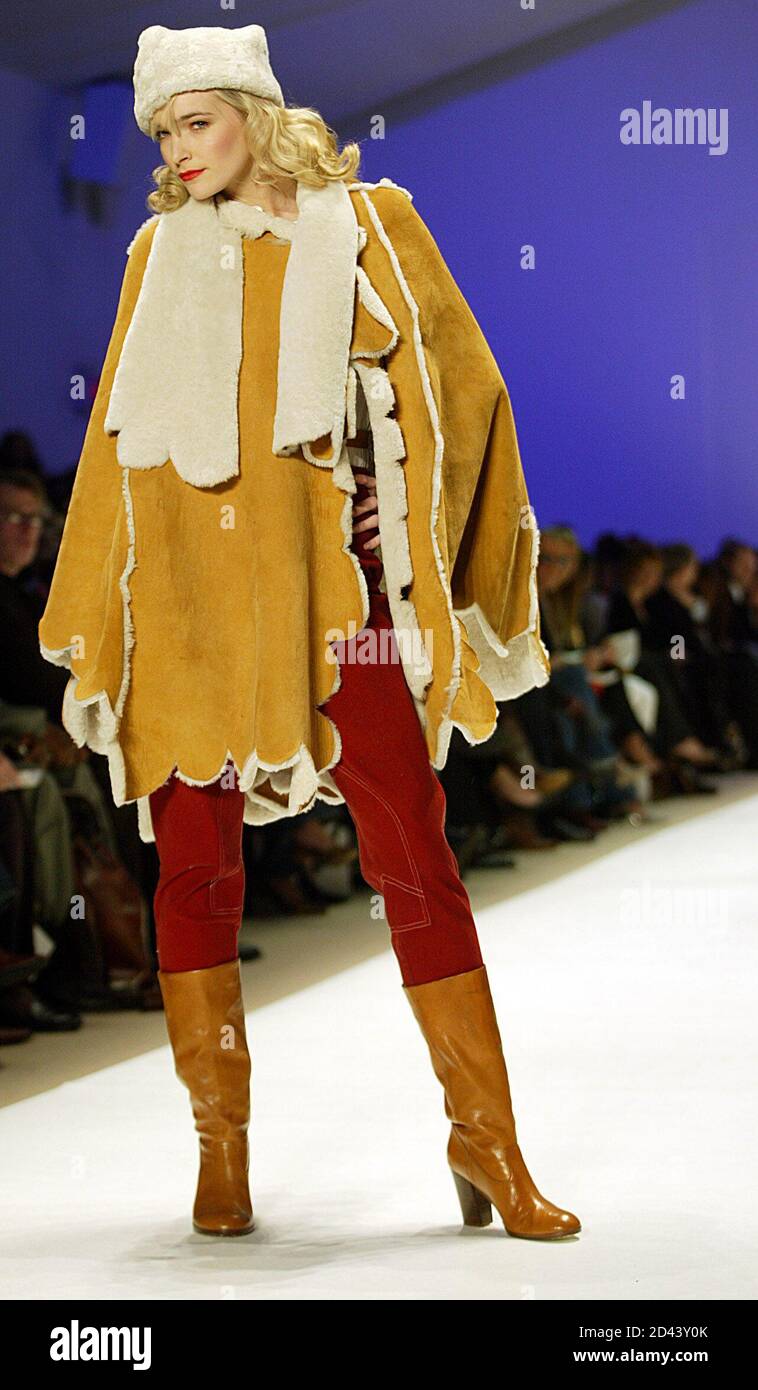 A Model Wears A Shearling Cloak With A Matching Cap At Fashion Week In New York On February 4 05 The Show Was Filmed For The Reality Tv Series Project Runway A
