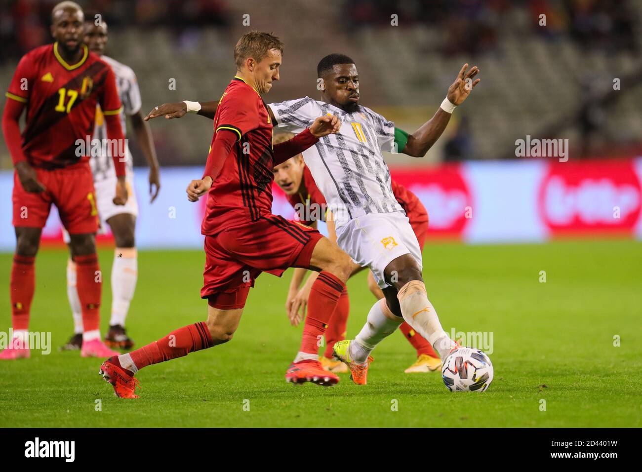 Brussels, Belgium. 8th Oct, 2020. Serge Aurier (R) of Cote d'Ivoire vies with Timothy Castagne of Belgium during a friendly match between Belgium and Cote d'Ivoire at the King Baudouin Stadium in Brussels, Belgium, Oct. 8, 2020. Credit: Zheng Huansong/Xinhua/Alamy Live News Stock Photo