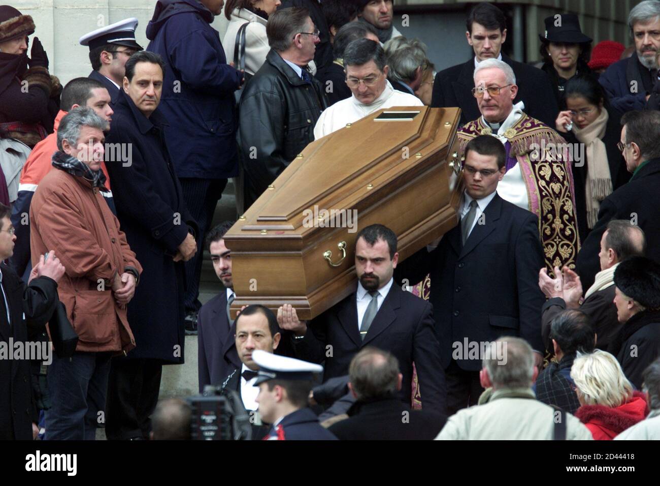 Family Members And Friends Follow The Casket Of French Singer Gilbert Becaud After A Funeral Ceremony At The Madeleine Church In Paris December 21 2001 Becaud Died Of Cancer Two Days Ago