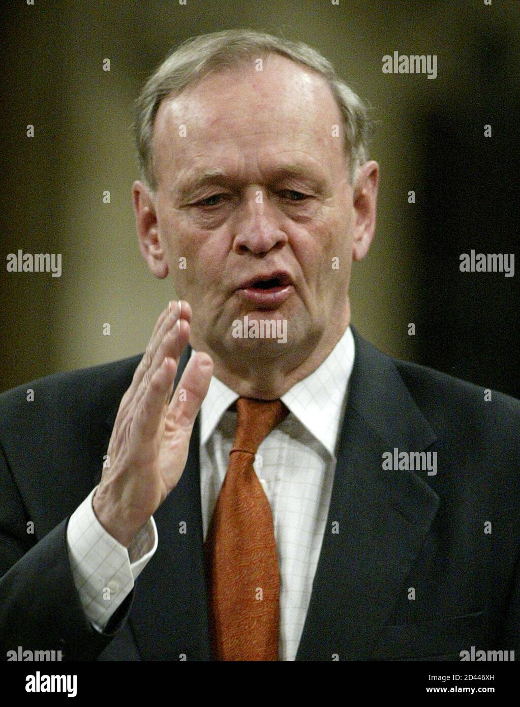 Canadian Prime Minister Jean Chretien speaks in the House of Commons, in Ottawa, March 25, 2003. Chretien continues to face questions about Canada's stance to not get involved in the war in Iraq. REUTERS/Jim Young  JY Stock Photo