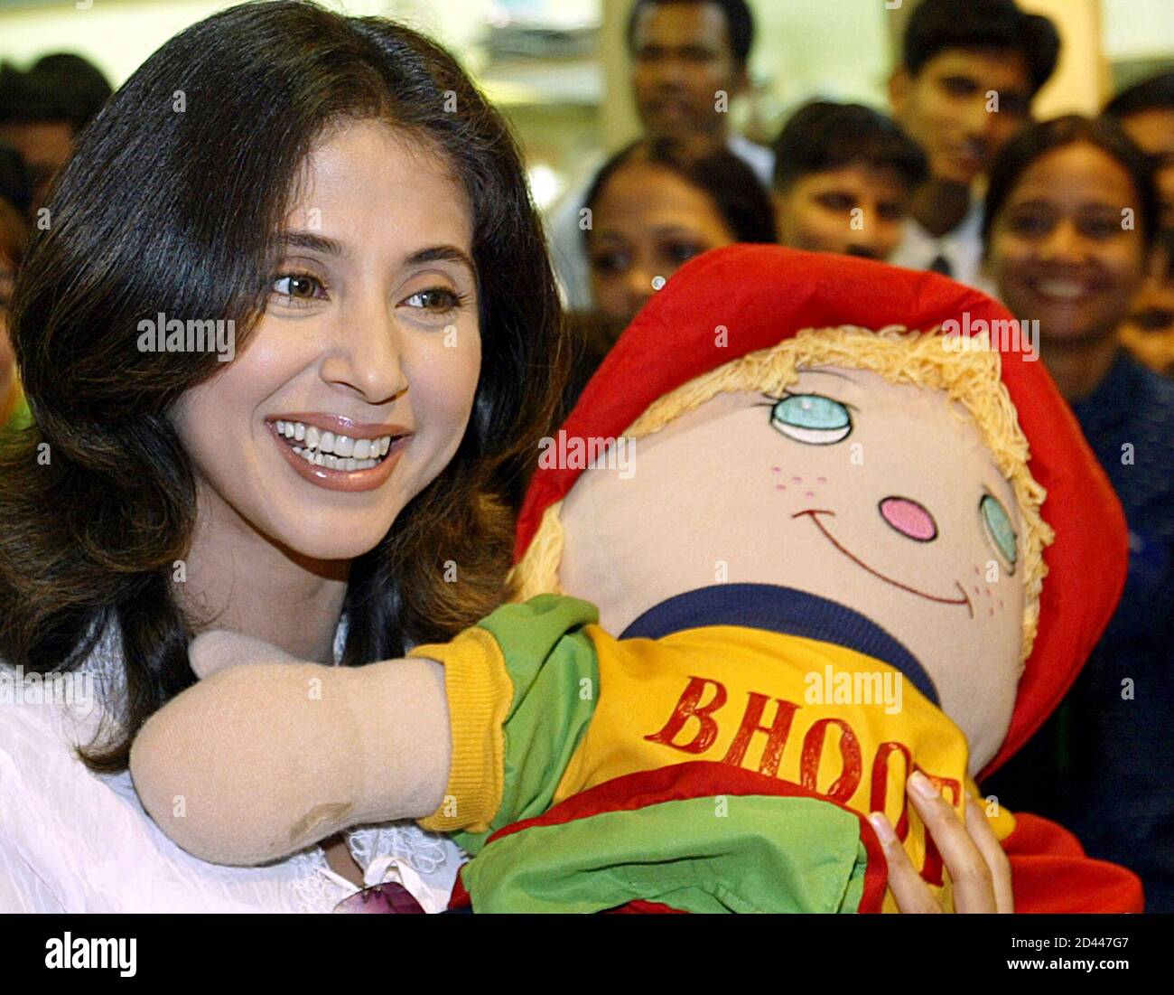 Popular Bollywood actress Urmila Matondkar cuddles a soft toy after